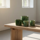 Atelier Marhaban Tamgrout geurkaars in groen en geel keramiek met natuurlijke glazuur, handgemaakt in Marokko.